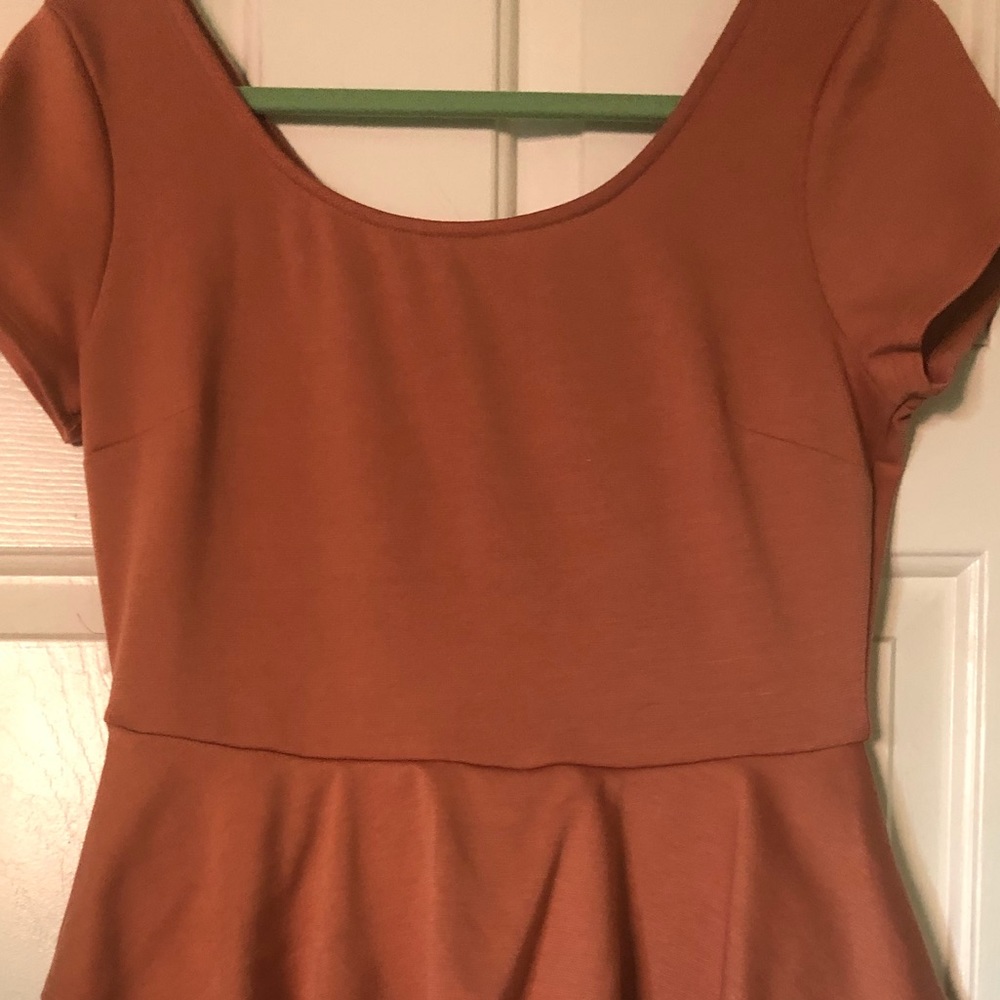 Burnt orange/peach colored peplum dress